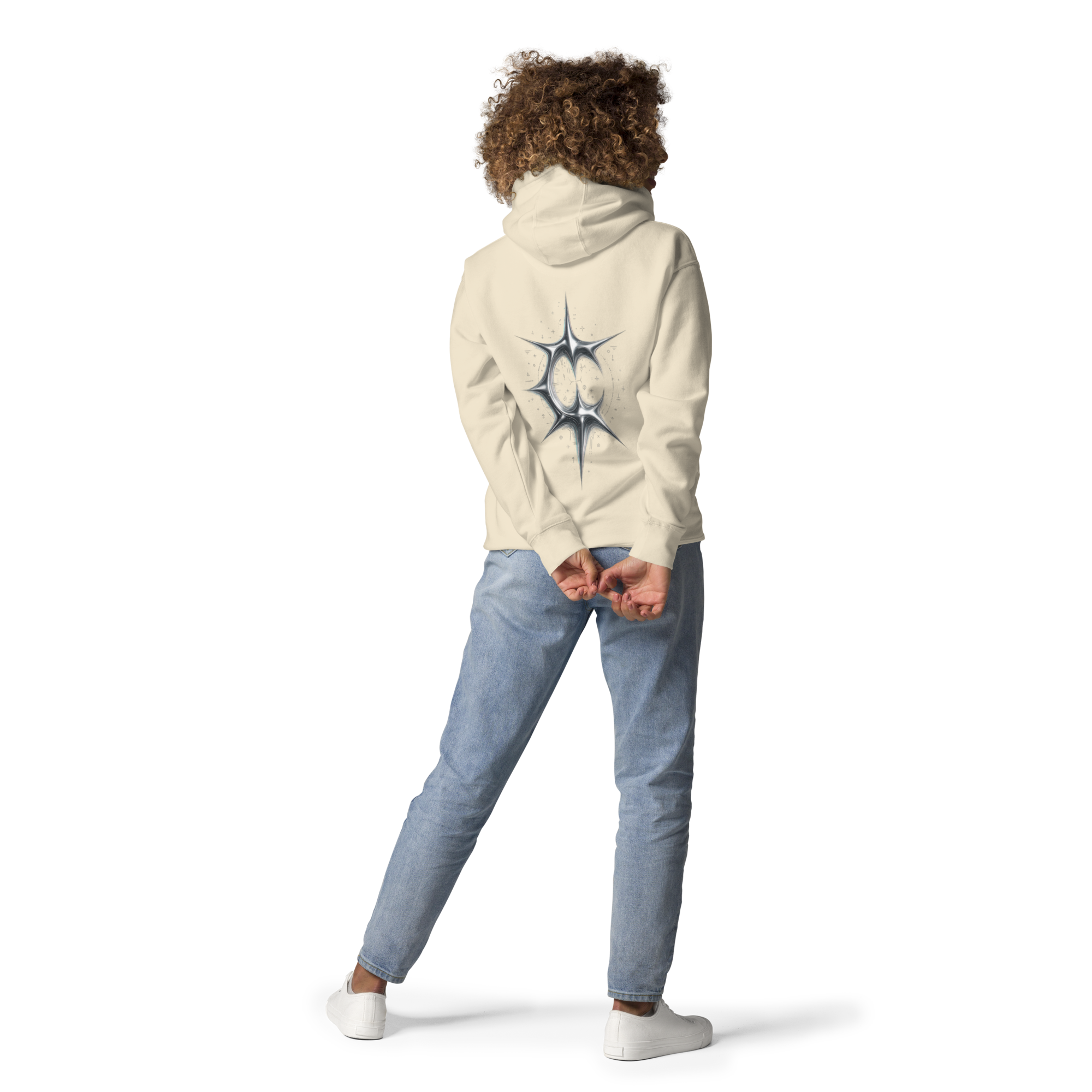 Person wearing a beige hoodie with a logo on the back, standing against a white background